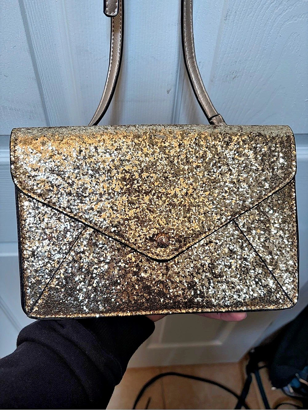 Poppy and Peonies RSVP clutch in champagne gold glitter